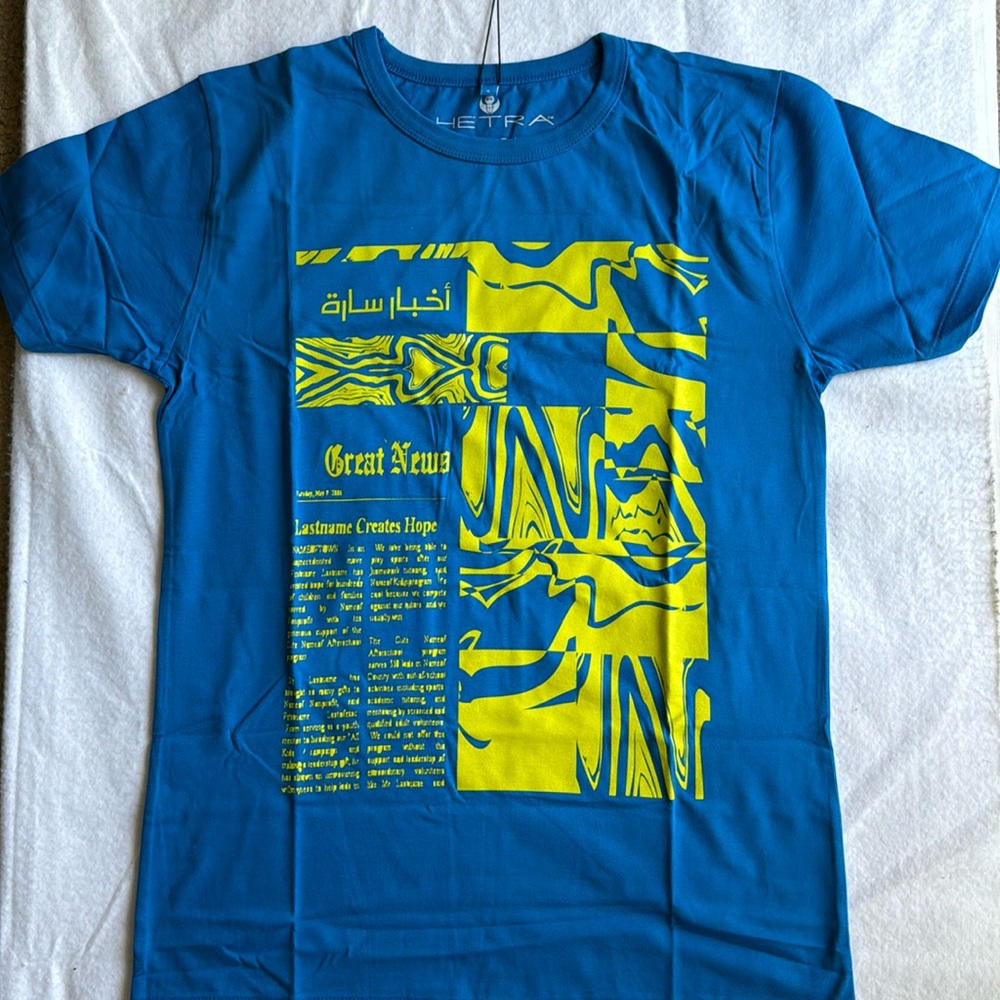Brand new with tags Bright blue tshirt “ Be Positive “